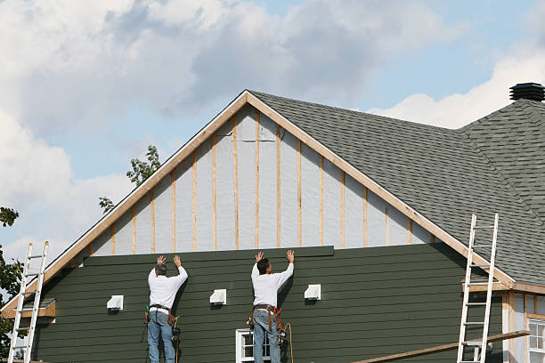Professional Siding Repair technician working in Stoutsville, OH